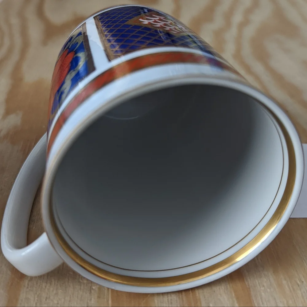 3/8 Fitz and Floyd Blue and Gold Coffee Mug